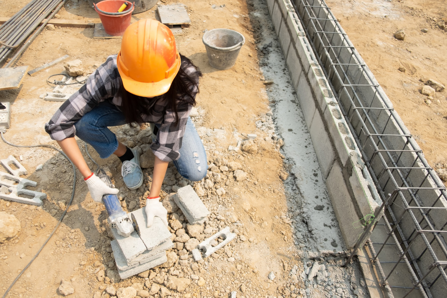 round-saw-hands-builder-work-laying-paving-slabs